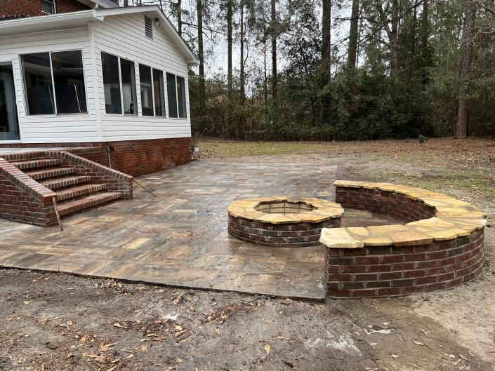 Steps , pavers, fire pit and seating wall 