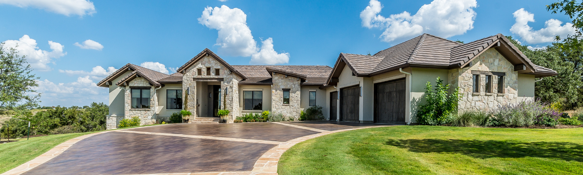 beautiful home with stone masonry details