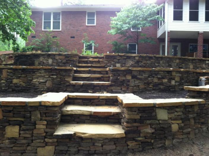 Landscape your yard with stunning stone slabs and create beautiful steps as well. 